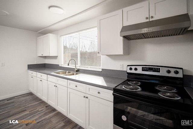 kitchen with dark countertops, electric range oven, white cabinets, a sink, and exhaust hood