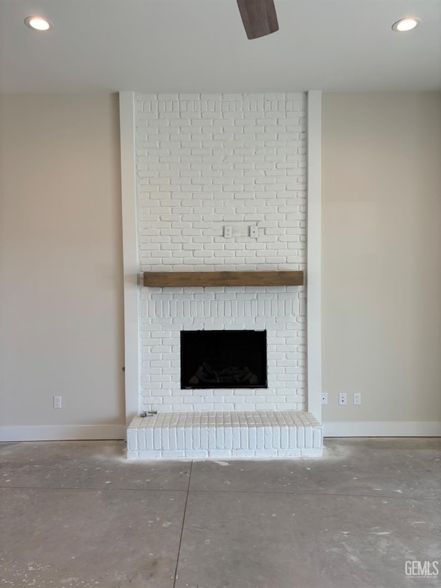 details featuring recessed lighting, a fireplace, and baseboards