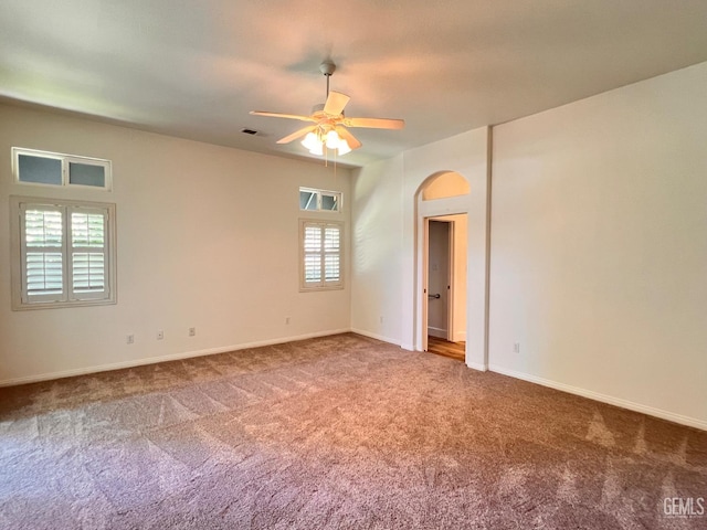 4812 Prairie Meadows Way, Bakersfield, CA 93312 - carpeted empty room featuring a ceiling fan and arched walkways