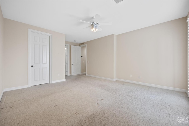 empty room with light carpet and ceiling fan