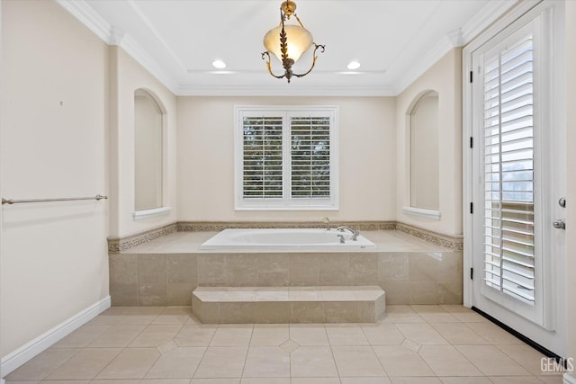 bathroom featuring tile patterned floors, crown molding, and tiled tub