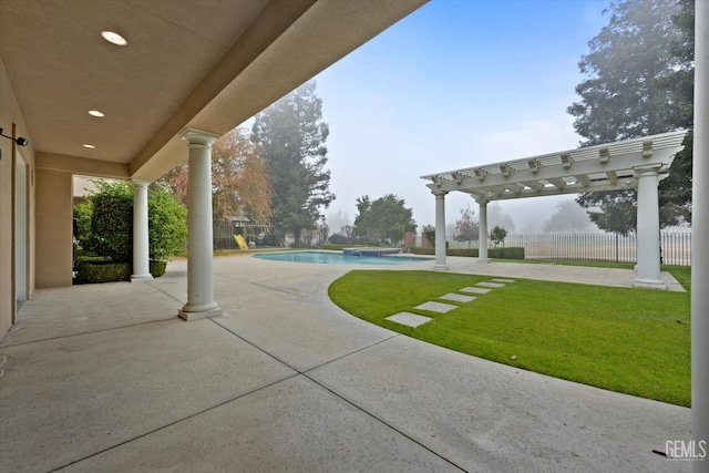 view of patio / terrace with a pergola and a fenced in pool