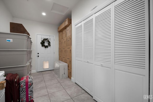 interior space featuring light tile patterned flooring