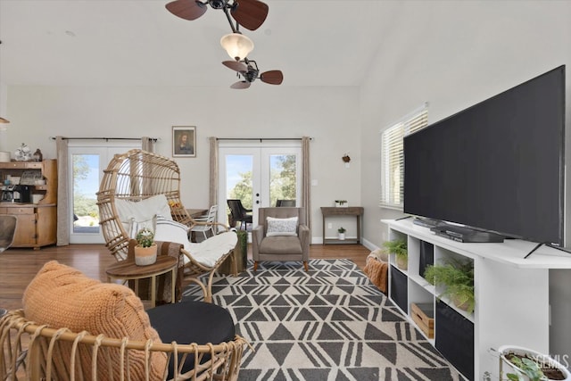 living room featuring french doors, hardwood / wood-style flooring, and ceiling fan