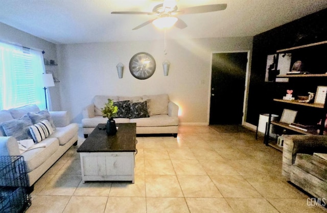 tiled living room with ceiling fan