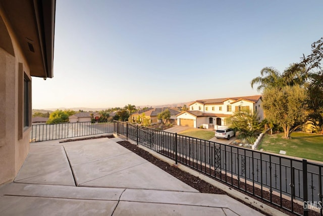 view of patio terrace at dusk