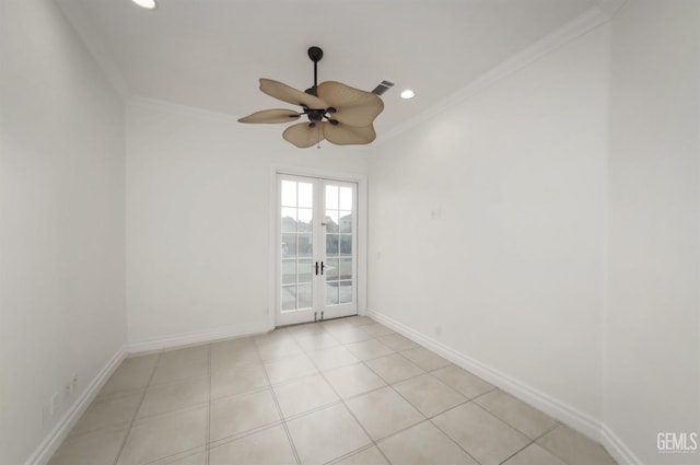 empty room with french doors, ceiling fan, and crown molding