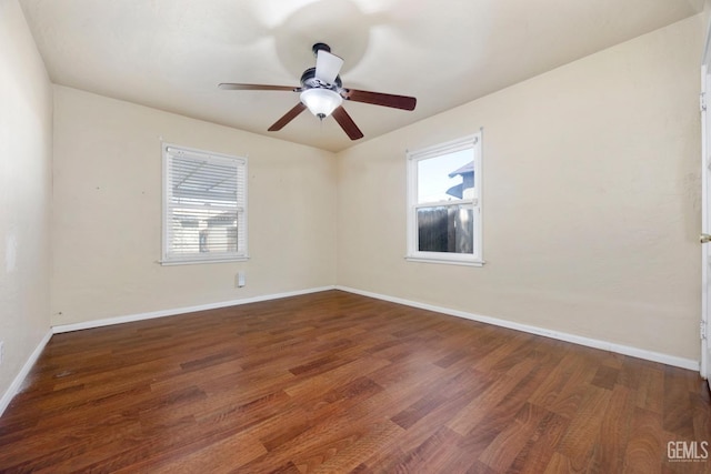 1909 Carrere St, Bakersfield, CA 93308 - empty room featuring baseboards, wood finished floors, and ceiling fan