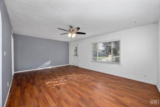 1909 Carrere St, Bakersfield, CA 93308 - spare room with baseboards, ceiling fan, and wood finished floors