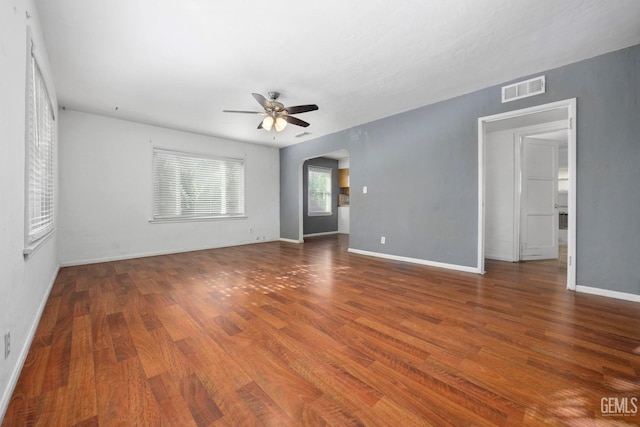 1909 Carrere St, Bakersfield, CA 93308 - spare room with baseboards, visible vents, wood finished floors, and ceiling fan