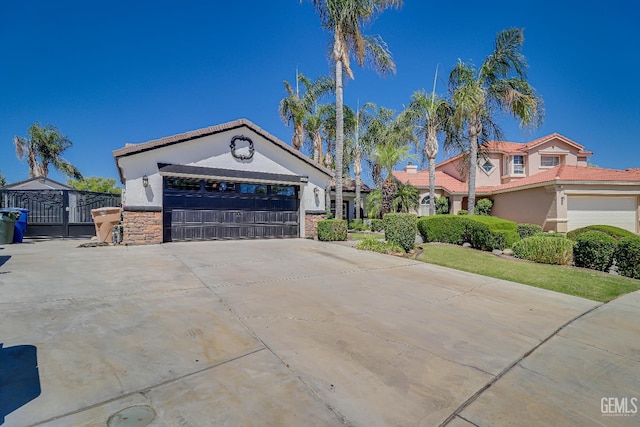 6800 Eagle Cap St, Bakersfield, CA 93313 - ranch-style home featuring stucco siding, stone siding, and a tiled roof