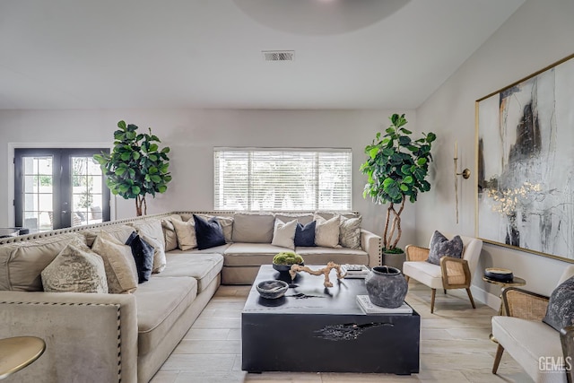 6800 Eagle Cap St, Bakersfield, CA 93313 - living room with french doors and light wood-style floors