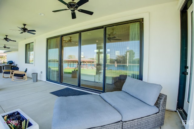 view of patio / terrace featuring ceiling fan