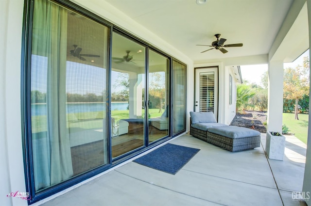 view of patio featuring ceiling fan