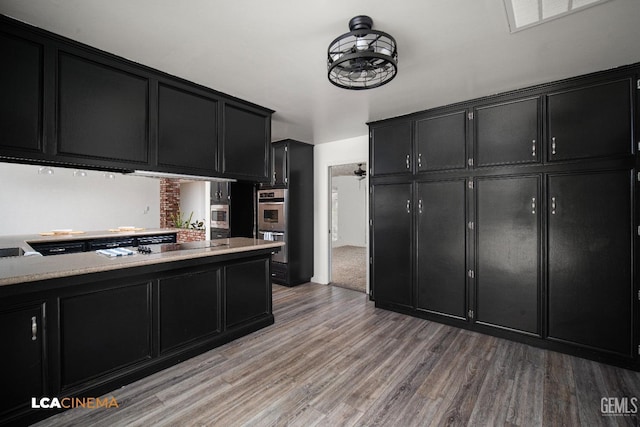 kitchen featuring hardwood / wood-style floors