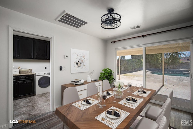 dining space featuring washer / dryer