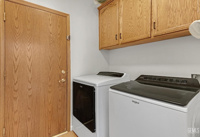 11602 Marazion Hill Ct, Bakersfield, CA 93311 - laundry area featuring washer and dryer and cabinet space