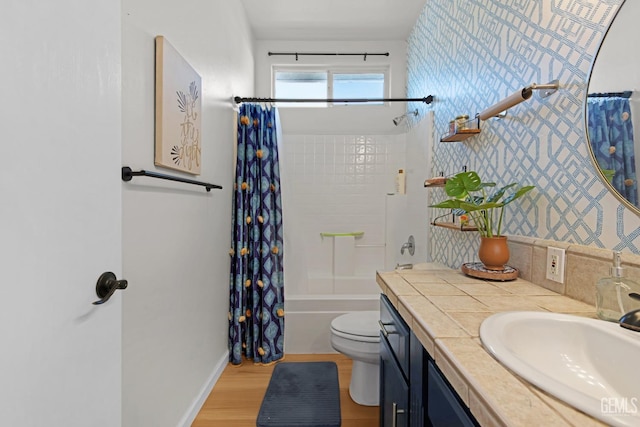 11602 Marazion Hill Ct, Bakersfield, CA 93311 - full bathroom featuring baseboards, toilet, wood finished floors, vanity, and shower / tub combo