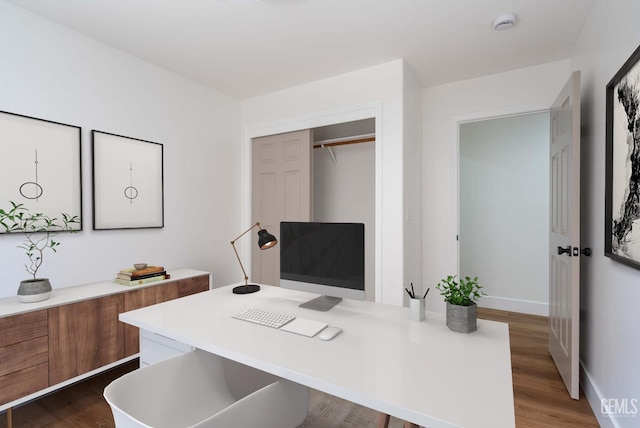 3702 Bedrock Dr, Bakersfield, CA 93311 - home office with baseboards and dark wood finished floors