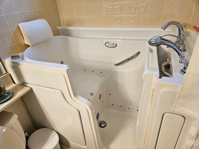 5708 Cypress Point Dr, Bakersfield, CA 93309 - bathroom with a whirlpool tub and tile walls