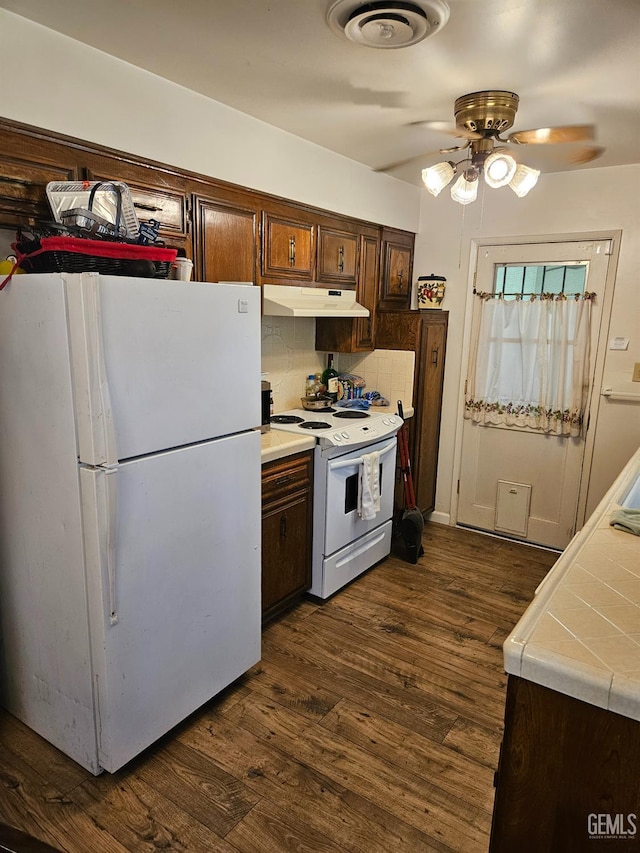 5708 Cypress Point Dr, Bakersfield, CA 93309 - kitchen featuring white appliances, under cabinet range hood, ceiling fan, and dark wood finished floors