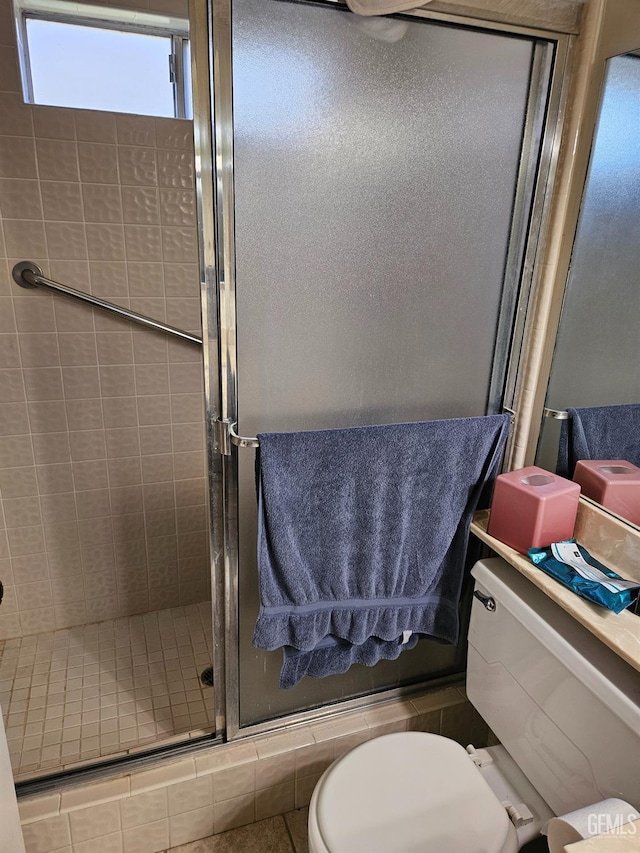 5708 Cypress Point Dr, Bakersfield, CA 93309 - full bathroom featuring a stall shower and toilet