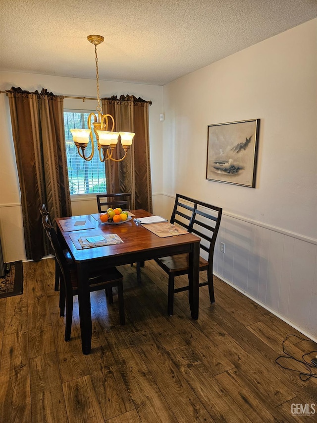 5708 Cypress Point Dr, Bakersfield, CA 93309 - dining room featuring wood-type flooring, a chandelier, a textured ceiling, and wainscoting