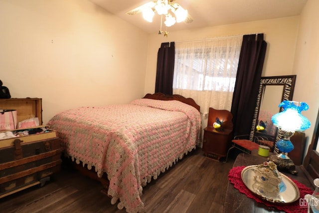 bedroom featuring ceiling fan and wood finished floors