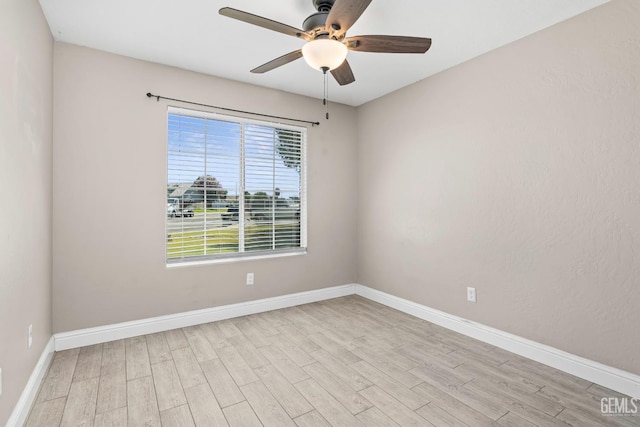 12017 Hannah Denise Ave, Bakersfield, CA 93312 - spare room with wood finished floors and ceiling fan