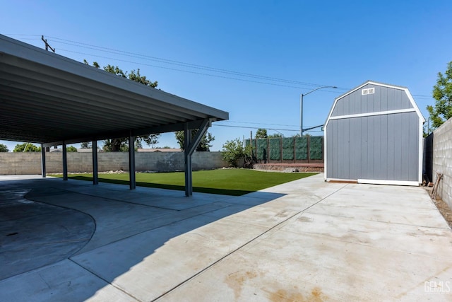 12017 Hannah Denise Ave, Bakersfield, CA 93312 - fenced backyard featuring a patio area and a storage shed