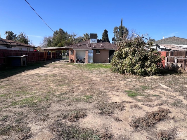 view of yard with a carport