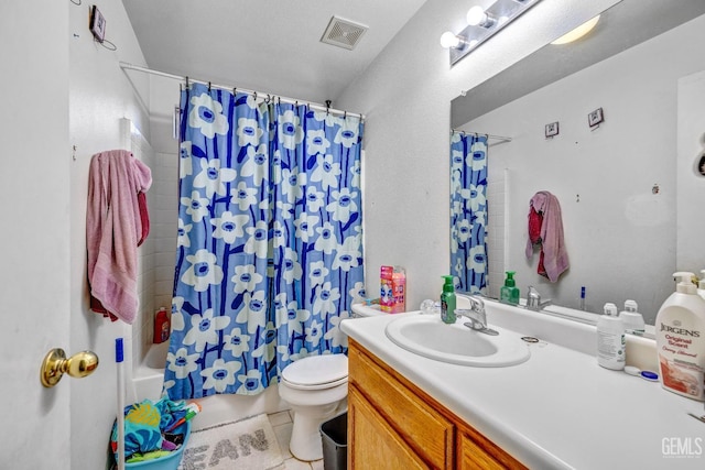 full bathroom featuring tile patterned flooring, vanity, toilet, and shower / bathtub combination with curtain