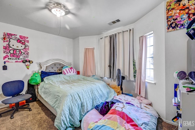 bedroom featuring carpet flooring, multiple windows, and ceiling fan