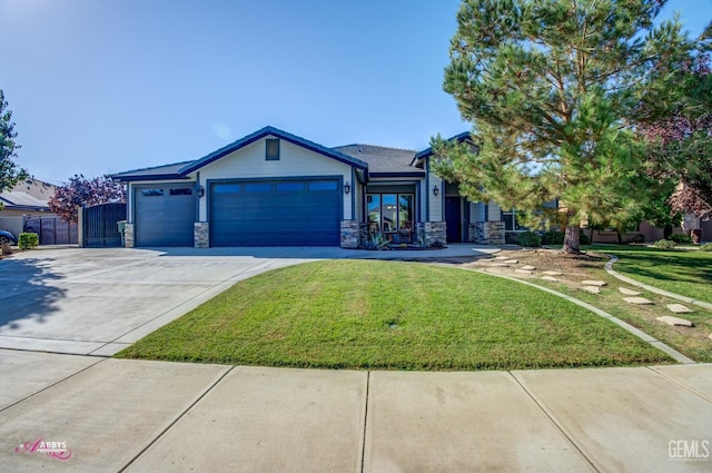 view of front facade featuring a front lawn and a garage