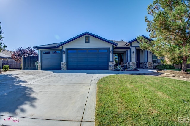 view of front of house featuring a garage and a front yard