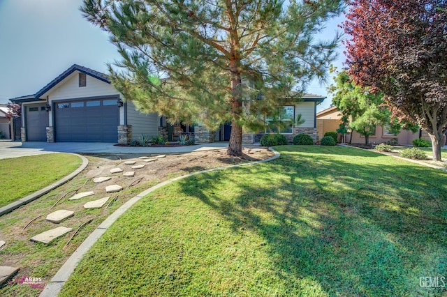 view of front of property with a garage and a front lawn