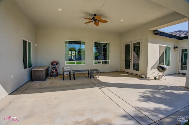 view of patio with ceiling fan and french doors