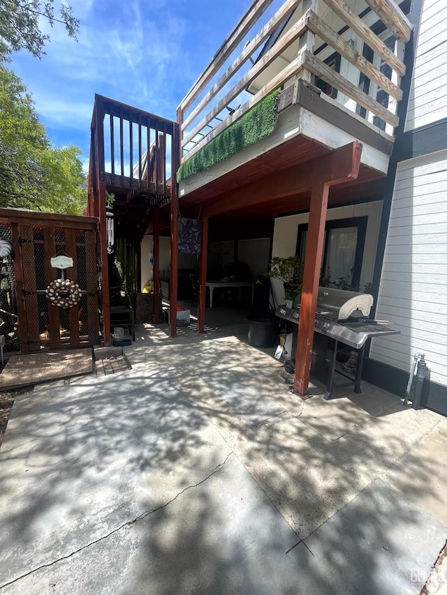 view of patio / terrace featuring stairway