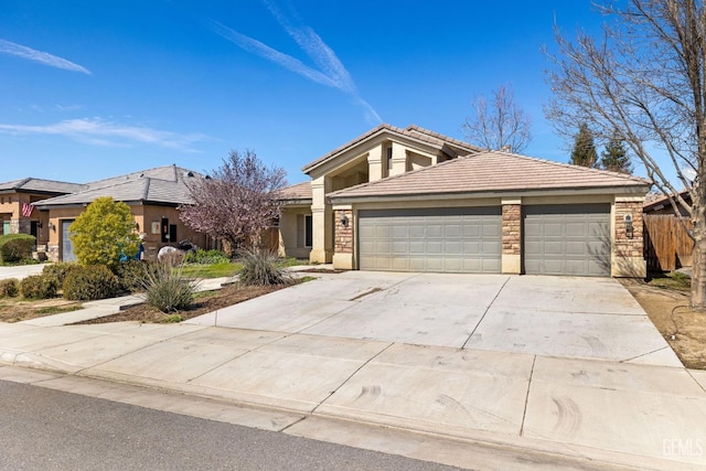 view of front of property featuring a tile roof, stucco siding, driveway, stone siding, and an attached garage