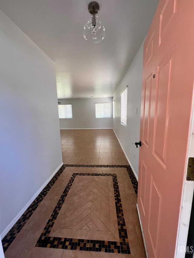9809 Battersea Park Dr, Bakersfield, CA 93312 - empty room with inlaid floor details and baseboards