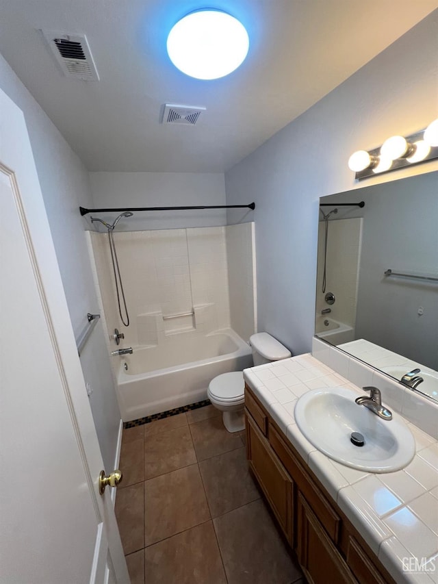 9809 Battersea Park Dr, Bakersfield, CA 93312 - full bathroom with shower / tub combination, vanity, tile patterned floors, and toilet