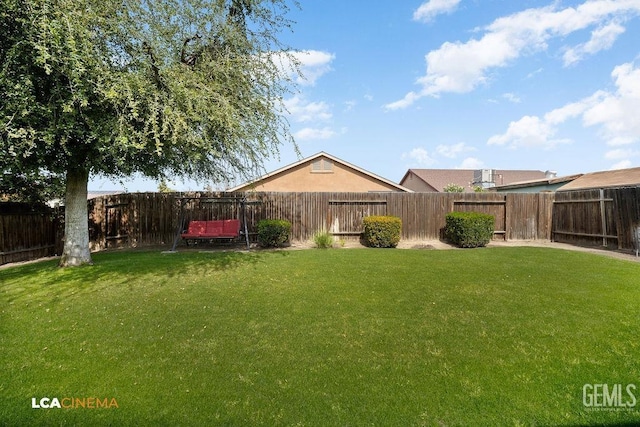 view of yard featuring a fenced backyard