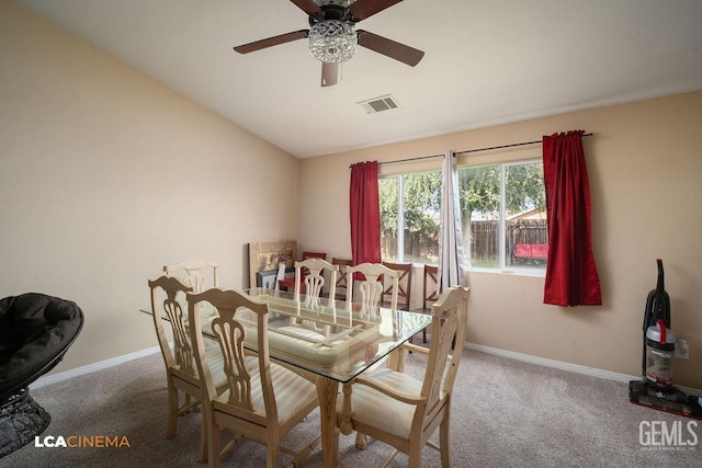 dining room featuring visible vents, baseboards, carpet, and a ceiling fan