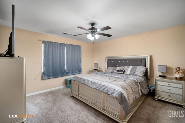 bedroom featuring carpet flooring, baseboards, visible vents, and ceiling fan