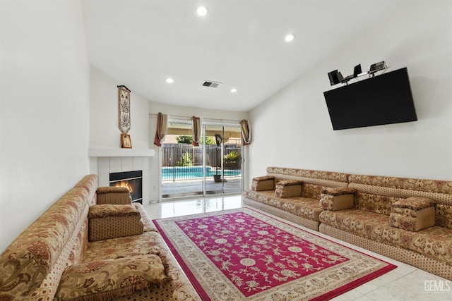 3023 Esperanza Dr, Bakersfield, CA 93313 - living room featuring recessed lighting, a tile fireplace, and tile patterned floors