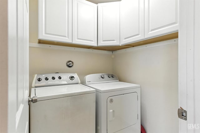 3023 Esperanza Dr, Bakersfield, CA 93313 - laundry room with washing machine and clothes dryer and cabinet space