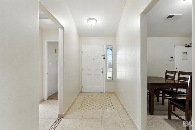 3023 Esperanza Dr, Bakersfield, CA 93313 - foyer entrance with light tile patterned floors and baseboards