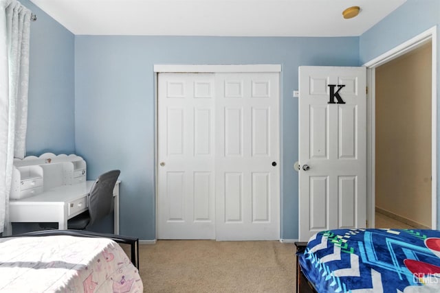 3023 Esperanza Dr, Bakersfield, CA 93313 - carpeted bedroom featuring a closet and baseboards