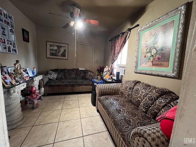 tiled living room featuring ceiling fan