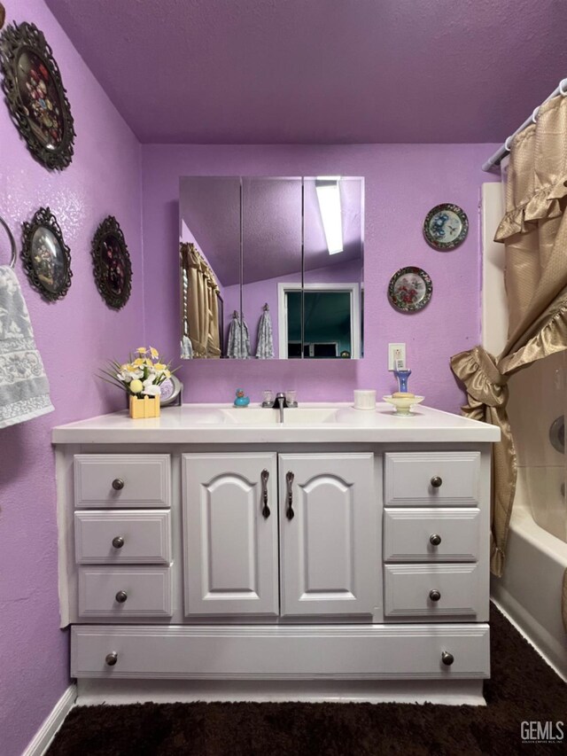 220 Tyler St, Taft, CA 93268 - bathroom featuring vanity and baseboards